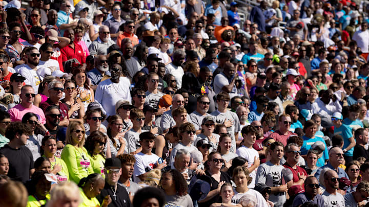Fans pledge to the flag before the 400-meter relay during the Class 1A UIL State track and field meet on May 3, 2025, at Mike A. Myers Stadium in Austin, Texas.