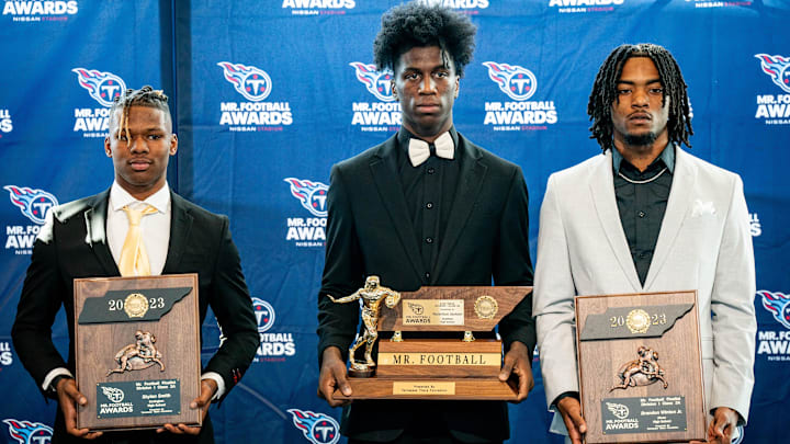 CLASS 3A: Skylan Smith, Covington, Sr. - Here finalist Smith, left, pose with winner Radarious Jackson, and finalist Brandon Winton Jr. during the Mr. Football Awards at Nissan Stadium in Nashville on Dec. 5, 2023. CLASS 3A: Skylan Smith, Covington, Sr. - Here finalist Smith, left, pose with winner Radarious Jackson, and finalist Brandon Winton Jr. during the Mr. Football Awards at Nissan Stadium in Nashville on Dec. 5, 2023.