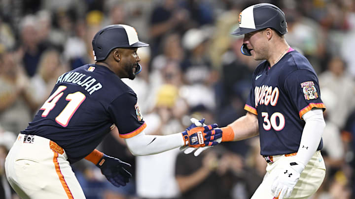 Apr 10, 2026; San Diego, California, USA; San Diego Padres left fielder Gavin Sheets (30) is congratulated by designated hitter Miguel Andujar (41) after he hit a solo home run during the fifth inning against the Colorado Rockies at Petco Park. Mandatory Credit: Denis Poroy-Imagn Images