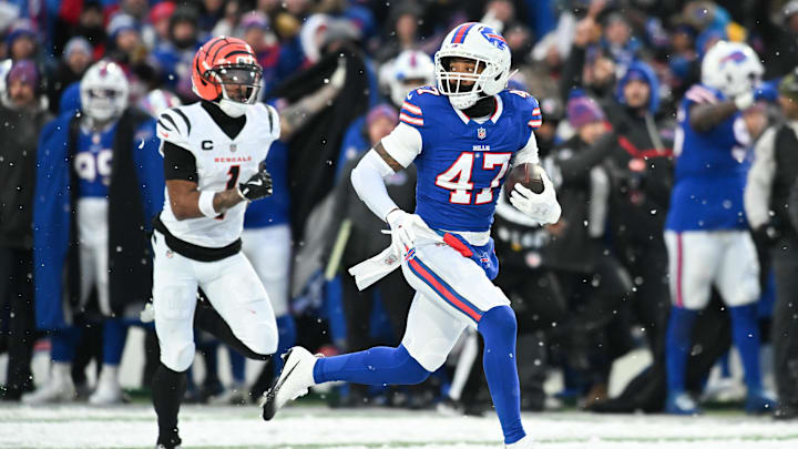 Dec 7, 2025; Orchard Park, New York, USA; Buffalo Bills cornerback Christian Benford (47) runs the ball for a touchdown after an interception against the Cincinnati Bengals in the fourth quarter at Highmark Stadium. Dec 7, 2025; Orchard Park, New York, USA; Buffalo Bills cornerback Christian Benford (47) runs the ball for a touchdown after an interception against the Cincinnati Bengals in the fourth quarter at Highmark Stadium.