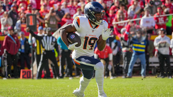 Nov 10, 2024; Kansas City, Missouri, USA; Denver Broncos wide receiver Marvin Mims Jr. (19) runs the ball against the Kansas City Chiefs during the first half at GEHA Field at Arrowhead Stadium. Mandatory Credit: Denny Medley-Imagn Images Nov 10, 2024; Kansas City, Missouri, USA; Denver Broncos wide receiver Marvin Mims Jr. (19) runs the ball against the Kansas City Chiefs during the first half at GEHA Field at Arrowhead Stadium. Mandatory Credit: Denny Medley-Imagn Images
