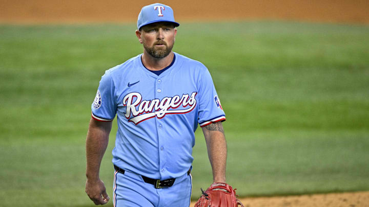 Sep 22, 2024; Arlington, Texas, USA; Texas Rangers relief pitcher Kirby Yates (39) walks off the field after he pitches against the Seattle Mariners during the ninth inning at Globe Life Field.