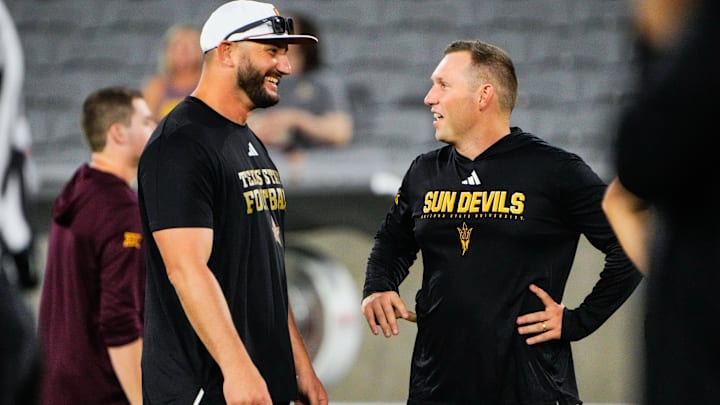 Sep 13, 2025; Tempe, Arizona, USA; Texas State Bobcats head coach G. J. Kinne and Arizona State Sun Devils head coach Kenny Dillingham speak before the game between Arizona State Sun Devils and Texas State Bobcats. Mandatory Credit: Arianna Grainey-Imagn Images Sep 13, 2025; Tempe, Arizona, USA; Texas State Bobcats head coach G. J. Kinne and Arizona State Sun Devils head coach Kenny Dillingham speak before the game between Arizona State Sun Devils and Texas State Bobcats. Mandatory Credit: Arianna Grainey-Imagn Images