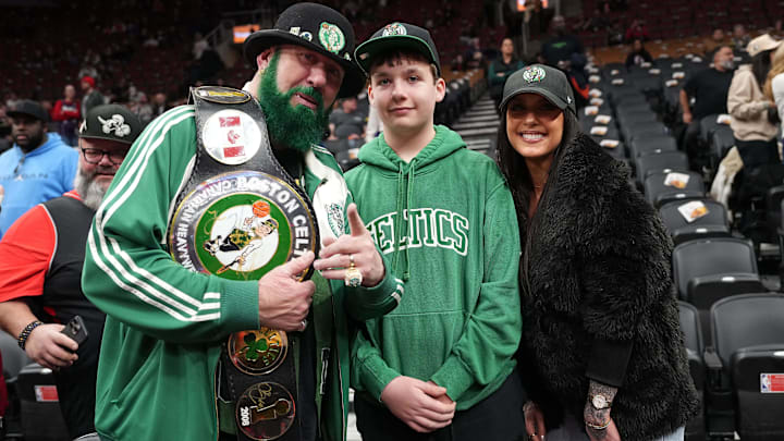 Boston Celtics fans show their support before a game against the Toronto Raptors at the Scotiabank Arena.