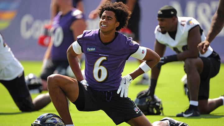 Jul 29, 2026; Ownings Mills, MD, USA; Baltimore Ravens wide receiver Ja’Kobi Lane (6) stretches during practice at the Under Armour Performance Center. Mandatory Credit: Mitch Stringer-Imagn Images Jul 29, 2026; Ownings Mills, MD, USA; Baltimore Ravens wide receiver Ja’Kobi Lane (6) stretches during practice at the Under Armour Performance Center. Mandatory Credit: Mitch Stringer-Imagn Images