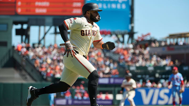 Sep 28, 2024; San Francisco, California, USA; San Francisco Giants outfielder Heliot Ramos (17) runs toward home to score a run on a fielding error by St. Louis Cardinals infielder Masyn Winn (0) (not pictured) during the first inning at Oracle Park. 