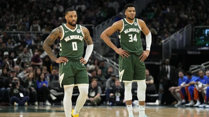 Milwaukee Bucks forward Giannis Antetokounmpo (34) and guard Damian Lillard.