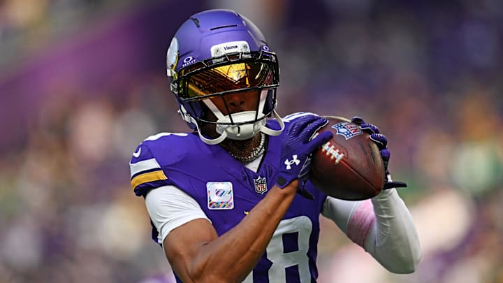Minnesota Vikings wide receiver Justin Jefferson (18) warms up before the game against the Philadelphia Eagles at U.S. Bank Stadium. 