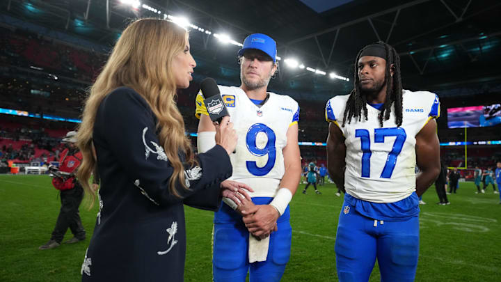 Oct 19, 2025; London, United Kingdom; NFL Network reporter Sara Walsh (left) interviews Los Angeles Rams quarterback Matthew Stafford (9) and wide receiver Davante Adams (17) after a NFL International Series game against the Jacksonville Jaguars at Wembley Stadium. Mandatory Credit: Kirby Lee-Imagn Images