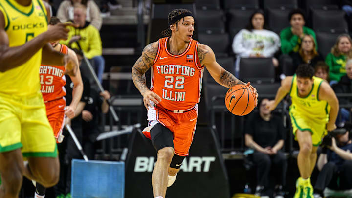 Jan 2, 2025; Eugene, Oregon, USA;  Illinois Fighting Illini guard Tre White (22) runs a fast break against the Oregon Ducks during the second half at Matthew Knight Arena. Mandatory Credit: Craig Strobeck-Imagn Images