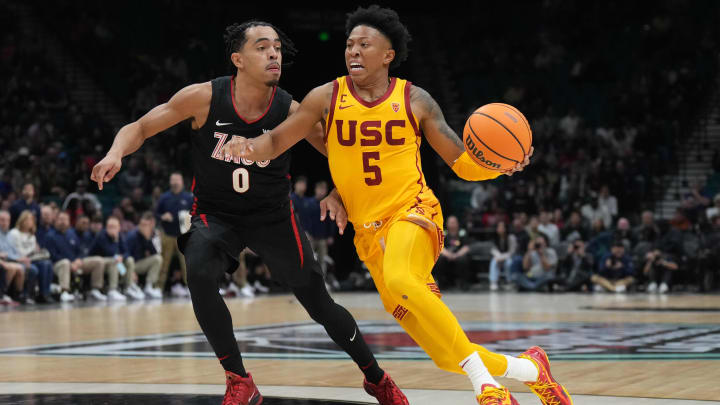 Dec 2, 2023; Las Vegas, Nevada, USA; Southern California Trojans guard Boogie Ellis (5) dribbles the ball against Gonzaga Bulldogs guard Ryan Nembhard (0) during the Legends of Basketball Las Vegas Invitational at MGM Grand Garden Arena. Mandatory Credit: Kirby Lee-USA TODAY Sports Dec 2, 2023; Las Vegas, Nevada, USA; Southern California Trojans guard Boogie Ellis (5) dribbles the ball against Gonzaga Bulldogs guard Ryan Nembhard (0) during the Legends of Basketball Las Vegas Invitational at MGM Grand Garden Arena. Mandatory Credit: Kirby Lee-USA TODAY Sports
