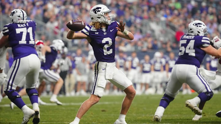 Kansas State quarterback Avery Johnson (2) throws a pass against Rutgers during second half of the Rate Bowl at Chase Field on Dec. 26, 2024, in Phoenix.