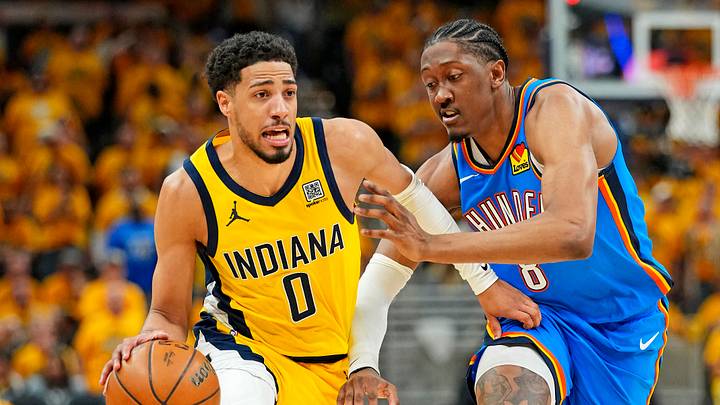 Jun 11, 2025; Indianapolis, Indiana, USA; Indiana Pacers guard Tyrese Haliburton (0) drives to the basket against Oklahoma City Thunder forward Jalen Williams (8) during the third quarter in game three of the 2025 NBA Finals at Gainbridge Fieldhouse. Mandatory Credit: Kyle Terada-Imagn Images