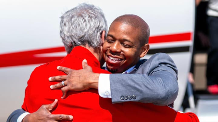 NC State AD Boo Corrigan hugs new men's basketball coach Justin Gainey after the announcement of Gainey becoming the new leader of the program on Tuesday, March 31, 2026. 