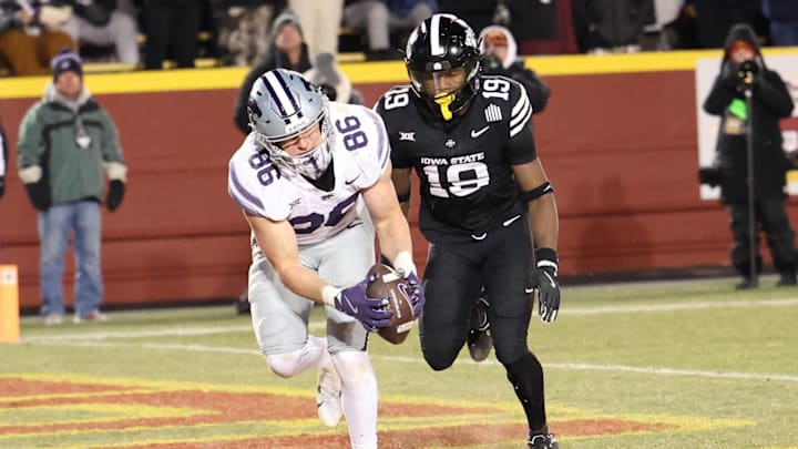 Nov 30, 2024; Ames, Iowa, USA; Kansas State Wildcats tight end Garrett Oakley (86) catches a touch down against the Iowa State Cyclones in the third quarter at Jack Trice Stadium. Mandatory Credit: Reese Strickland-Imagn Images