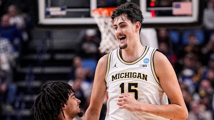 Michigan center Aday Mara (15), center, celebrates a play against Saint Louis with guard Elliot Cadeau (3) Michigan center Aday Mara (15), center, celebrates a play against Saint Louis with guard Elliot Cadeau (3)