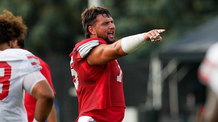 Ohio State Buckeyes offensive lineman Carson Hinzman (75) points at a teammate during the third day of training camp at the Woody Hayes Athletic Center on Aug. 8, 2026 in Columbus, Ohio.