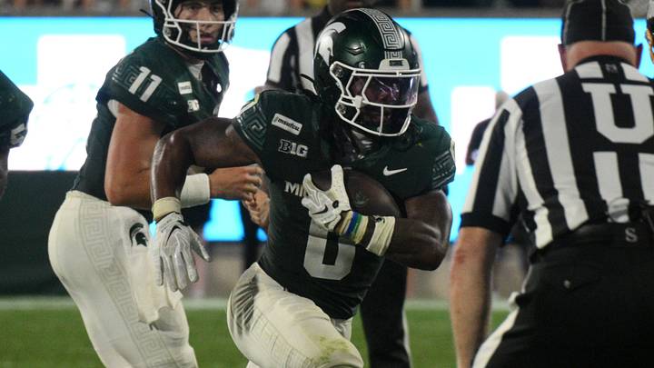 Sep 4, 2026; East Lansing, Michigan, USA; Michigan State Spartans running back Cam Edwards (0) runs with the ball during the game against the Toledo Rockets at Spartan Stadium. Mandatory Credit: Dale Young-Imagn Images Sep 4, 2026; East Lansing, Michigan, USA; Michigan State Spartans running back Cam Edwards (0) runs with the ball during the game against the Toledo Rockets at Spartan Stadium. Mandatory Credit: Dale Young-Imagn Images