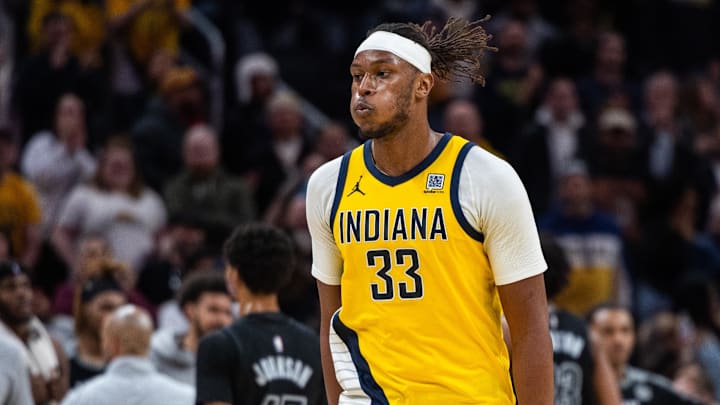 Mar 20, 2025; Indianapolis, Indiana, USA; Indiana Pacers center Myles Turner (33) celebrates the game winning block in the game against the Brooklyn Nets at Gainbridge Fieldhouse. Mandatory Credit: Trevor Ruszkowski-Imagn Images