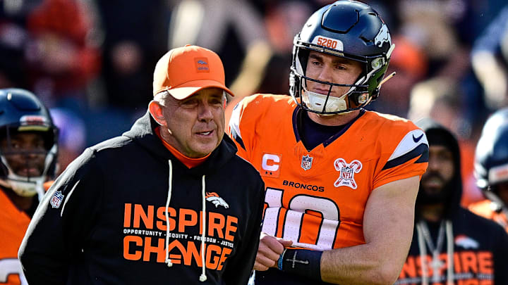 DENVER, CO - DECEMBER 21: Denver Broncos head coach Sean Payton and quarterback Bo Nix (10) have a word before a game between the Jacksonville Jaguars and the Denver Broncos at Empower Field at Mile High on December 21, 2025 in Denver, Colorado.