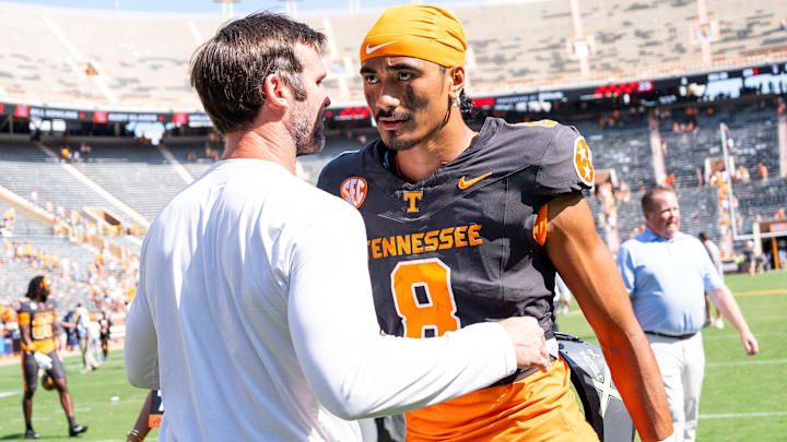 Tennessee quarterback Nico Iamaleava (8) hugs offensive coordinator Joey Halzle after Tennessee's game against Chattanooga in Neyland Stadium in Knoxville on Saturday, Aug. 31, 2024.
