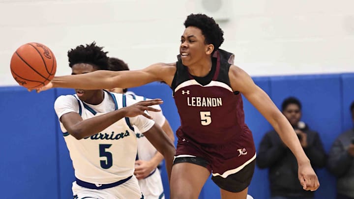 Lebanon forward Anthony Thompson (5) chases after a loose ball during their during their 50-61 loss to Winton Woods Friday, Jan. 5, 2024.