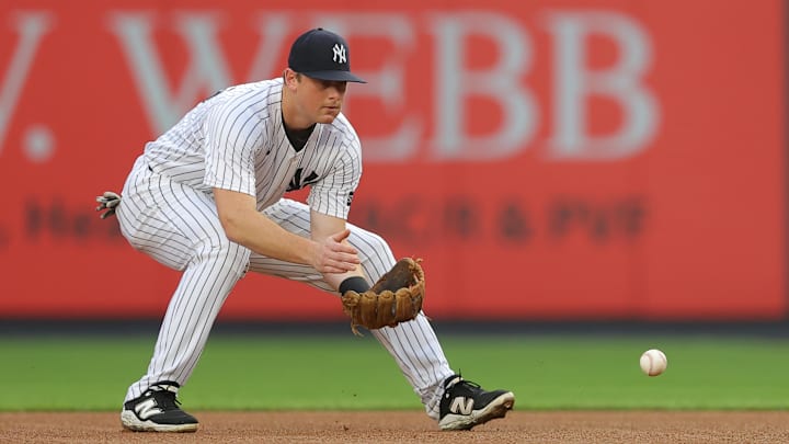Jun 17, 2025; Bronx, New York, USA; New York Yankees second baseman DJ LeMahieu (26) fields a ground ball against the Los Angeles Angels during the first inning at Yankee Stadium. Mandatory Credit: Brad Penner-Imagn Images Jun 17, 2025; Bronx, New York, USA; New York Yankees second baseman DJ LeMahieu (26) fields a ground ball against the Los Angeles Angels during the first inning at Yankee Stadium. Mandatory Credit: Brad Penner-Imagn Images