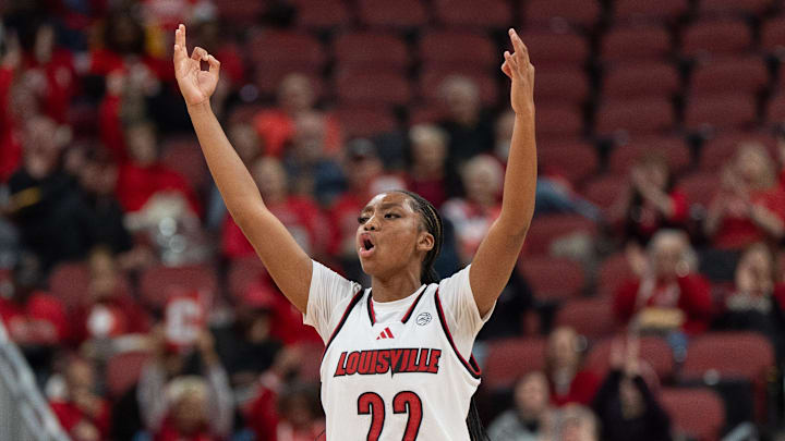 Louisville Cardinals guard Tajianna Roberts (22) celebrates after a play during their game against the Grambling Lady Tigers on Thursday, Dec. 12, 2024 at the KFC Yum! Center in Louisville, Ky. Louisville Cardinals guard Tajianna Roberts (22) celebrates after a play during their game against the Grambling Lady Tigers on Thursday, Dec. 12, 2024 at the KFC Yum! Center in Louisville, Ky.