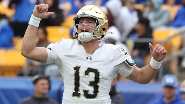 Nov 15, 2025; Pittsburgh, Pennsylvania, USA;  Notre Dame Fighting Irish quarterback CJ Carr (13) calls an audible at the line of scrimmage against the Pittsburgh Panthers during the fourth quarter at Acrisure Stadium. Mandatory Credit: Charles LeClaire-Imagn Images