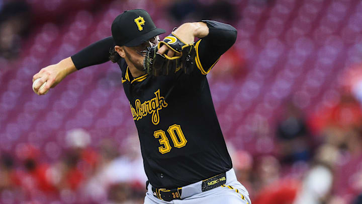 Sep 24, 2025; Cincinnati, Ohio, USA; Pittsburgh Pirates starting pitcher Paul Skenes (30) pitches against the Cincinnati Reds in the first inning at Great American Ball Park. Mandatory Credit: Katie Stratman-Imagn Images