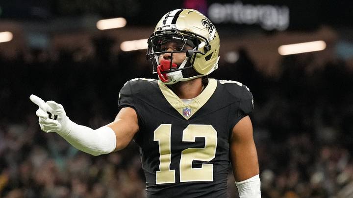 Dec 14, 2025; New Orleans, Louisiana, USA; New Orleans Saints wide receiver Chris Olave (12) reacts after scoring a touchdown in the fourth quarter against the Carolina Panthers at Caesars Superdome. Dec 14, 2025; New Orleans, Louisiana, USA; New Orleans Saints wide receiver Chris Olave (12) reacts after scoring a touchdown in the fourth quarter against the Carolina Panthers at Caesars Superdome.