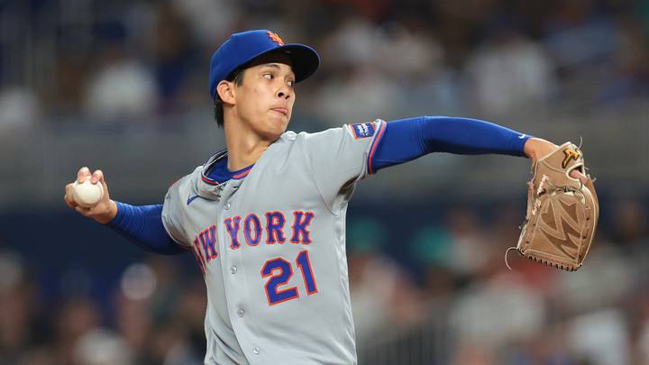 May 22, 2026; Miami, Florida, USA; New York Mets relief pitcher Jonah Tong (21) delivers a pitch against the Miami Marlins during the sixth inning at loanDepot Park. Mandatory Credit: Sam Navarro-Imagn Images