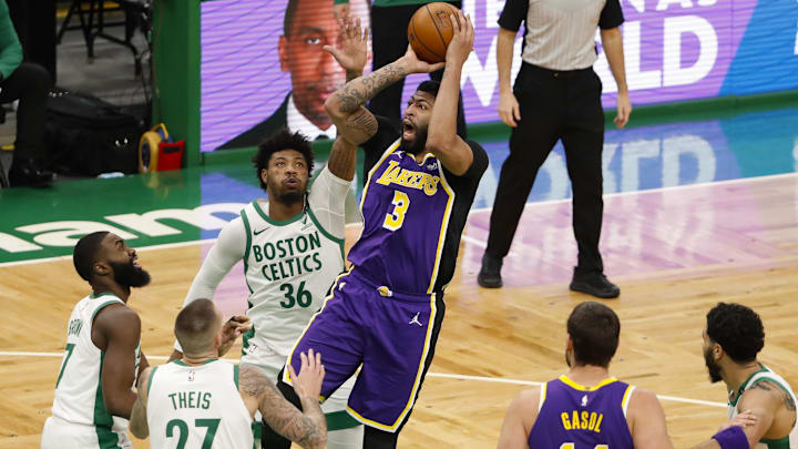 Jan 30, 2021; Boston, Massachusetts, USA; Los Angeles Lakers forward Anthony Davis (3) shoots over three Boston Celtics including guard Marcus Smart (36) during the third quarter at TD Garden. Mandatory Credit: Winslow Townson-Imagn Images Jan 30, 2021; Boston, Massachusetts, USA; Los Angeles Lakers forward Anthony Davis (3) shoots over three Boston Celtics including guard Marcus Smart (36) during the third quarter at TD Garden. Mandatory Credit: Winslow Townson-Imagn Images
