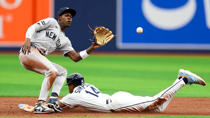 Apr 12, 2026; St. Petersburg, Florida, USA; Tampa Bay Rays left fielder Chandler Simpson (14) steals second base past New York Yankees second baseman Jazz Chisholm Jr. (13) in the second inning at Tropicana Field. Mandatory Credit: Nathan Ray Seebeck-Imagn Images Apr 12, 2026; St. Petersburg, Florida, USA; Tampa Bay Rays left fielder Chandler Simpson (14) steals second base past New York Yankees second baseman Jazz Chisholm Jr. (13) in the second inning at Tropicana Field. Mandatory Credit: Nathan Ray Seebeck-Imagn Images