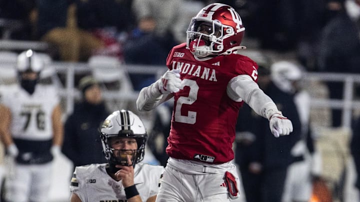 Nov 30, 2024; Bloomington, Indiana, USA; Indiana Hoosiers linebacker Jailin Walker (2) celebrates the sack of Purdue Boilermakers quarterback Ryan Browne (15) in the second half at Memorial Stadium. Mandatory Credit: Trevor Ruszkowski-Imagn Images Nov 30, 2024; Bloomington, Indiana, USA; Indiana Hoosiers linebacker Jailin Walker (2) celebrates the sack of Purdue Boilermakers quarterback Ryan Browne (15) in the second half at Memorial Stadium. Mandatory Credit: Trevor Ruszkowski-Imagn Images