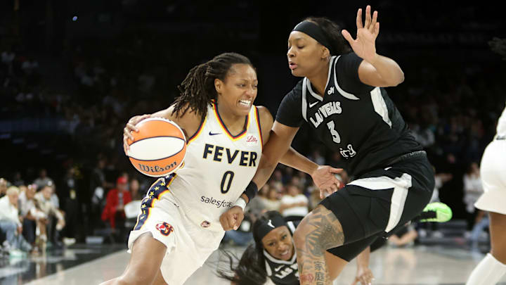 Even after veteran guard Kelsey Mitchell (left) exited the game midway through the third quarter, Indiana managed to keep Las Vegas on its heels and forced overtime. Even after veteran guard Kelsey Mitchell (left) exited the game midway through the third quarter, Indiana managed to keep Las Vegas on its heels and forced overtime.