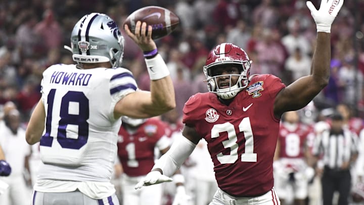 Dec 31, 2022; New Orleans, LA, USA;  Kansas State quarterback Will Howard (18) throws under pressure