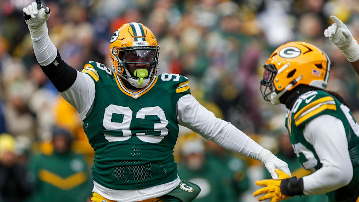 Green Bay Packers defensive tackle T.J. Slaton (93) celebrates with defensive end Rashan Gary (52) after Gary tallies a sack against the Chicago Bears on Sunday, January 5, 2025, at Lambeau Field in Green Bay, Wis. 
Tork Mason/USA TODAY NETWORK-Wisconsin