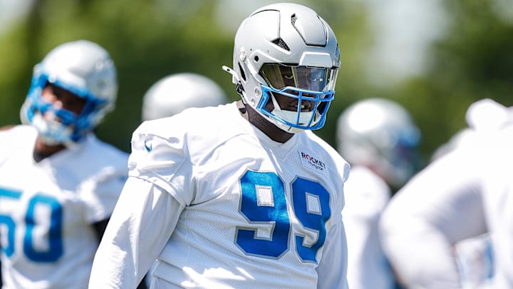 Detroit Lions defensive tackle Brodric Martin (99) practices during OTAs at Detroit Lions headquarters and practice facility in Allen Park.