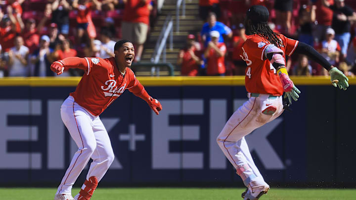 Sep 1, 2025; Cincinnati, Ohio, USA; Cincinnati Reds outfielder Noelvi Marte (16) celebrates with shortstop Elly De La Cruz (44) after the walk-off victory over the Toronto Blue Jays at Great American Ball Park. Mandatory Credit: Katie Stratman-Imagn Images