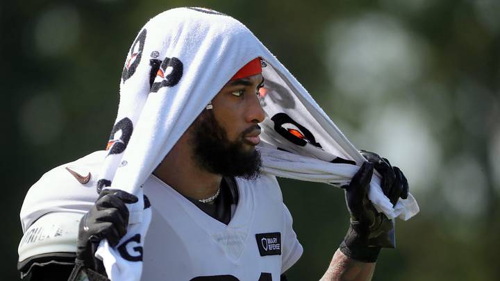 Cleveland Browns cornerback Denzel Ward (21) watches practice from the sideline during NFL training camp at CrossCountry Mortgage Campus, Wednesday, July 30, 2025, in Berea, Ohio.