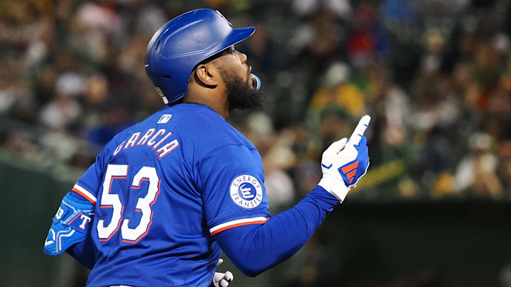 Sep 25, 2024; Oakland, California, USA; Texas Rangers right fielder Adolis Garcia (53) gestures after hitting a two-run home run against the Oakland Athletics during the third inning at Oakland-Alameda County Coliseum.
