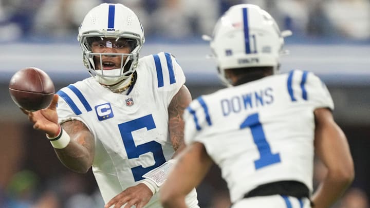 Indianapolis Colts quarterback Anthony Richardson (5) passes to Indianapolis Colts wide receiver Josh Downs (1) on Sunday, Dec. 22, 2024, during a game against the Tennessee Titans at Lucas Oil Stadium in Indianapolis. The pass fell incomplete.