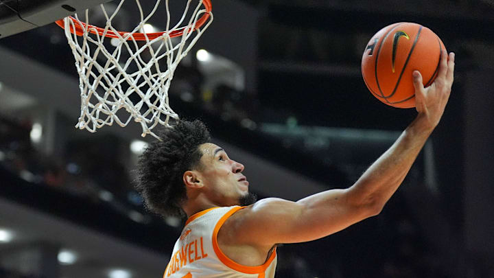 Tennessee guard Bishop Boswell (3) shoots a layup over his head during a NCAA basketball game between Tennessee and Texas A&M at Thompson-Boling Arena at Food City Center in Knoxville, Tenn., on Jan. 13, 2026.