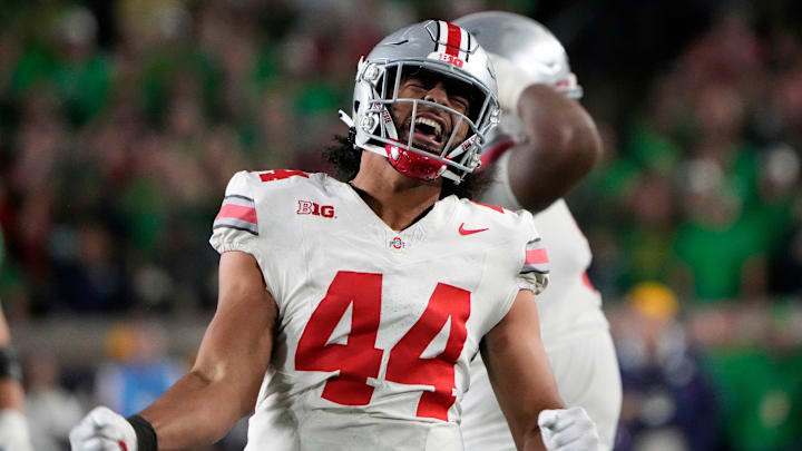 Sep 23, 2023; South Bend, Indiana, USA; Ohio State Buckeyes defensive end JT Tuimoloau (44) celebrates after knocking down a pass against Notre Dame Fighting Irish during the fourth quarter of their game at Notre Dame Stadium.