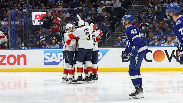 Apr 30, 2025; Tampa, Florida, USA; Florida Panthers center Aleksander Barkov (16) is congratulated  after he scored a goal against the Tampa Bay Lightning during the second period of game five of the first round of the 2025 Stanley Cup Playoffs at Amalie Arena. Mandatory Credit: Kim Klement Neitzel-Imagn Images
