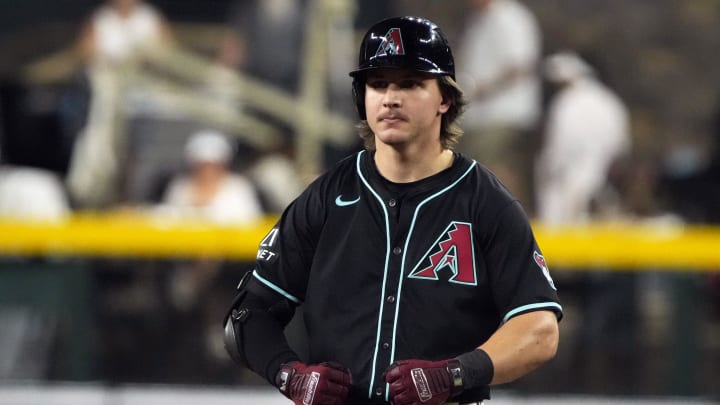 Jun 3, 2024; Phoenix, Arizona, USA; Arizona Diamondbacks outfielder Jake McCarthy (31) reacts after hitting a double against the San Francisco Giants in the ninth inning at Chase Field. Mandatory Credit: Rick Scuteri-USA TODAY Sports Jun 3, 2024; Phoenix, Arizona, USA; Arizona Diamondbacks outfielder Jake McCarthy (31) reacts after hitting a double against the San Francisco Giants in the ninth inning at Chase Field. Mandatory Credit: Rick Scuteri-USA TODAY Sports