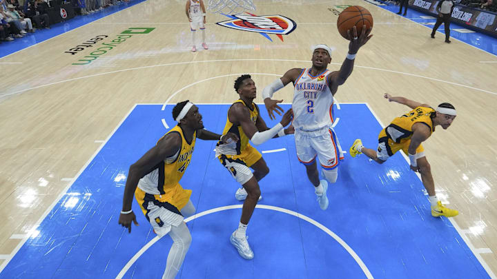 Jun 16, 2025; Oklahoma City, Oklahoma, USA; Oklahoma City Thunder guard Shai Gilgeous-Alexander (2) shoots past Indiana Pacers forward Pascal Siakam, left, and Indiana Pacers guard Andrew Nembhard, right, during the first half during game five of the 2025 NBA Finals at Paycom Center. Mandatory Credit: Nate Billings/Pool Photo via Imagn Images