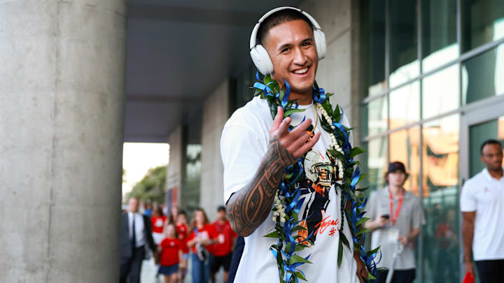 Arizona Wildcats wide receiver Tetairoa McMillan walks down the Wildcat Walk before the game against Texas Tech at Arizona Stadium.