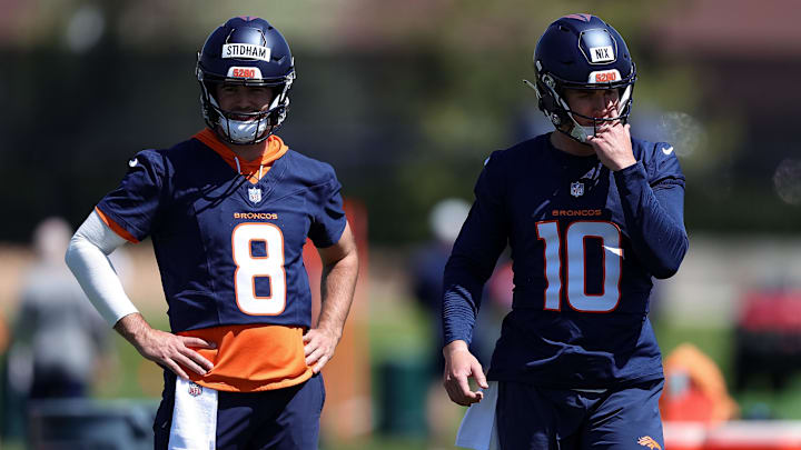 May 23, 2024; Englewood, CO, USA; Denver Broncos quarterback Jarrett Stidham (8) and quarterback Bo Nix (10) during organized team activities at Centura Health Training Center. Mandatory Credit: Isaiah J. Downing-USA TODAY Sports